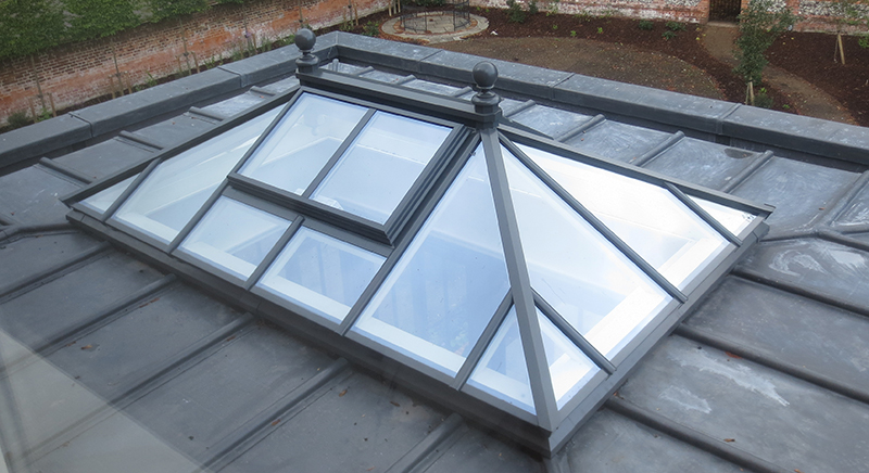 Roof lantern as part of an orangery extension in slate grey