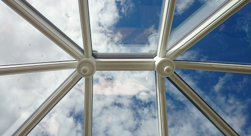 Looking into the sky through a roof lantern